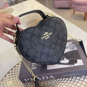 Coach Black Heart Crossbody Bag with Gold Accents